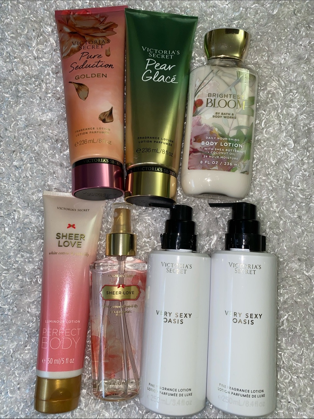7 pcs Victoria's Secret body lotions and mists - pink, green, white, gold